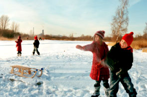 Children throwing snowballs